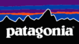 Patagonia logo featuring stylized mountain peaks with purple and red horizontal stripes above the brand name on a black background.